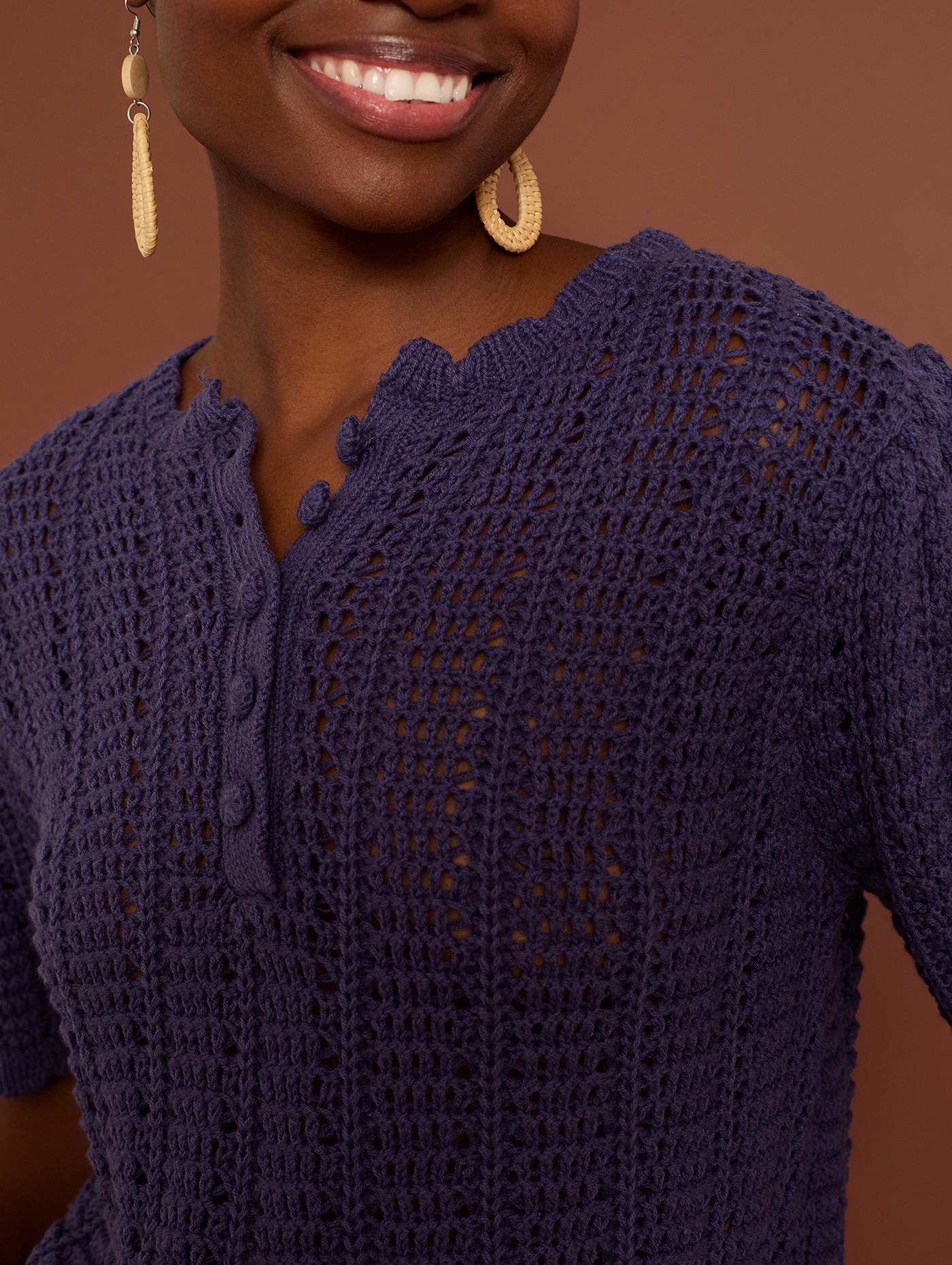 Crochet openwork jumper with ruffled sleeves and buttons 1