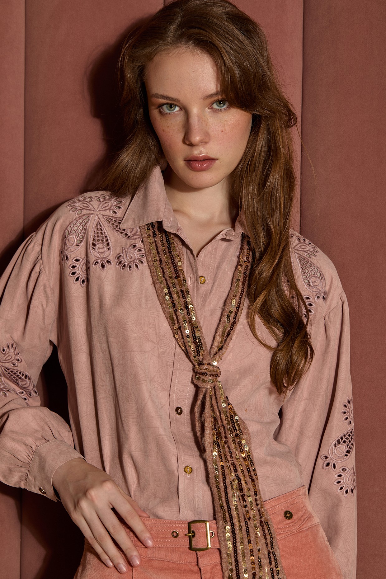 Shirt with die-cut embroidery